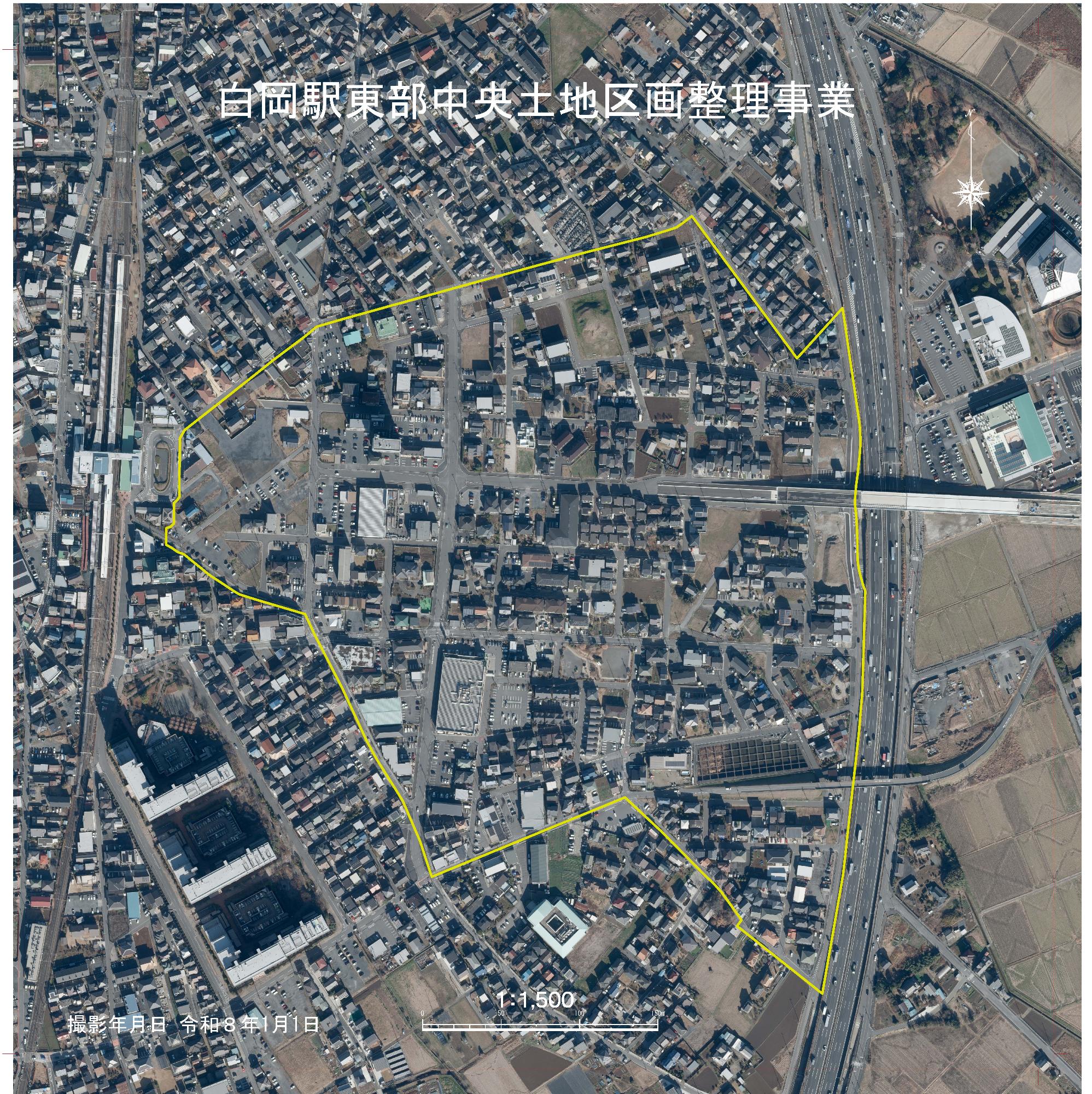 空中から撮影された令和6年1月1日の白岡駅東部中央土地区画を黄色い線で囲んだ画像