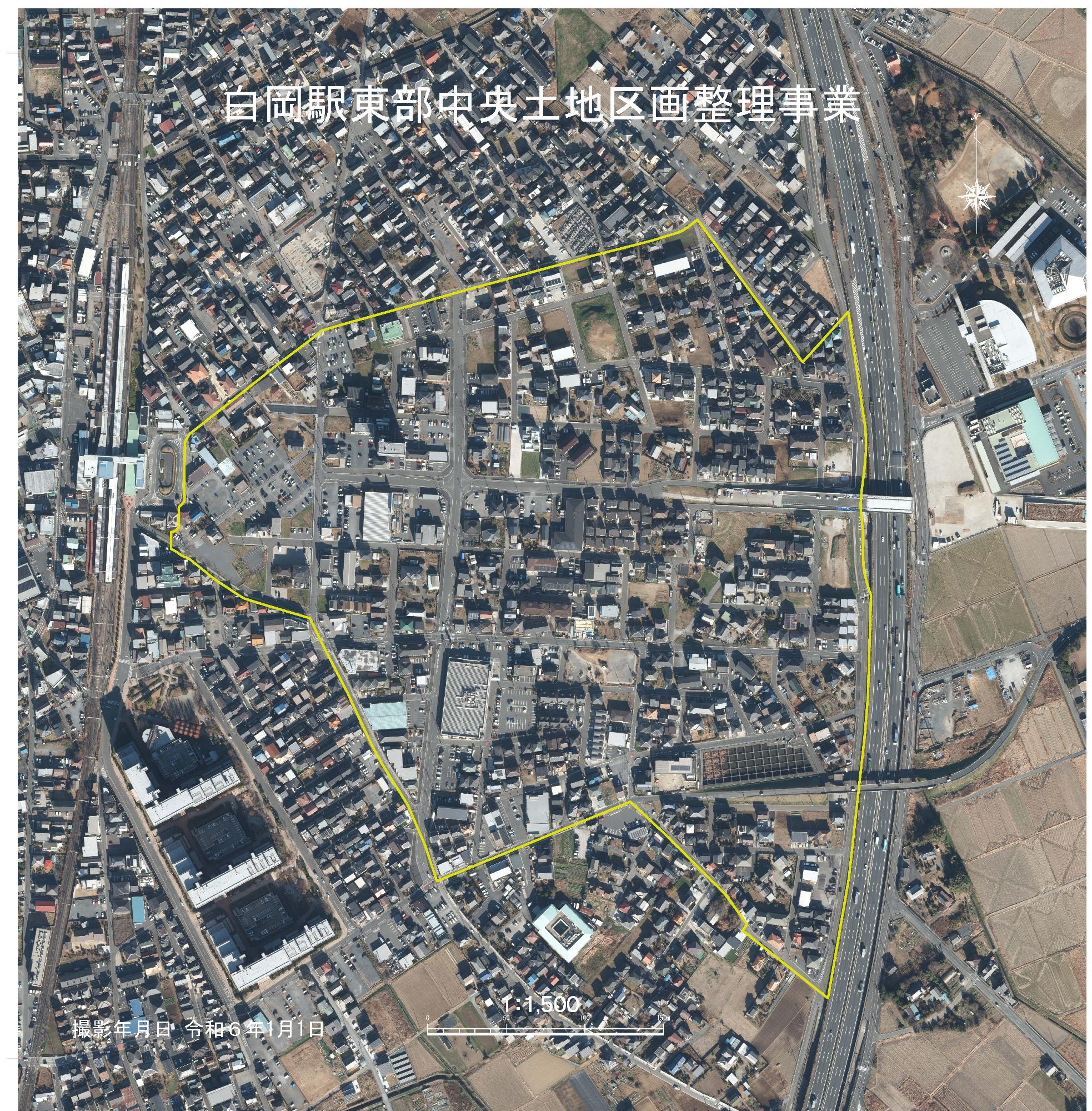 空中から撮影された令和6年1月1日の白岡駅東部中央土地区画を黄色い線で囲んだ画像